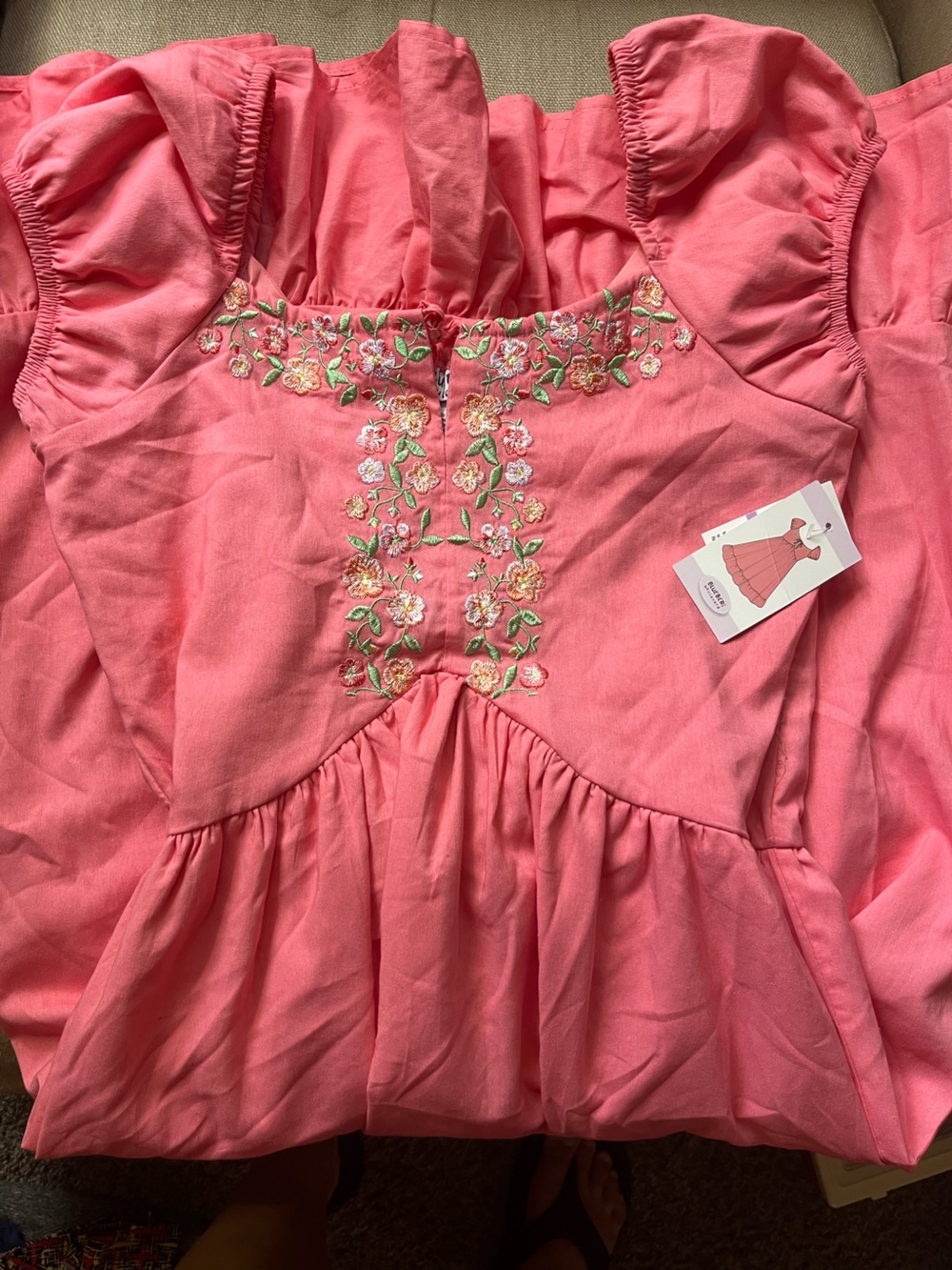 Pink smocked and embroidered dress
